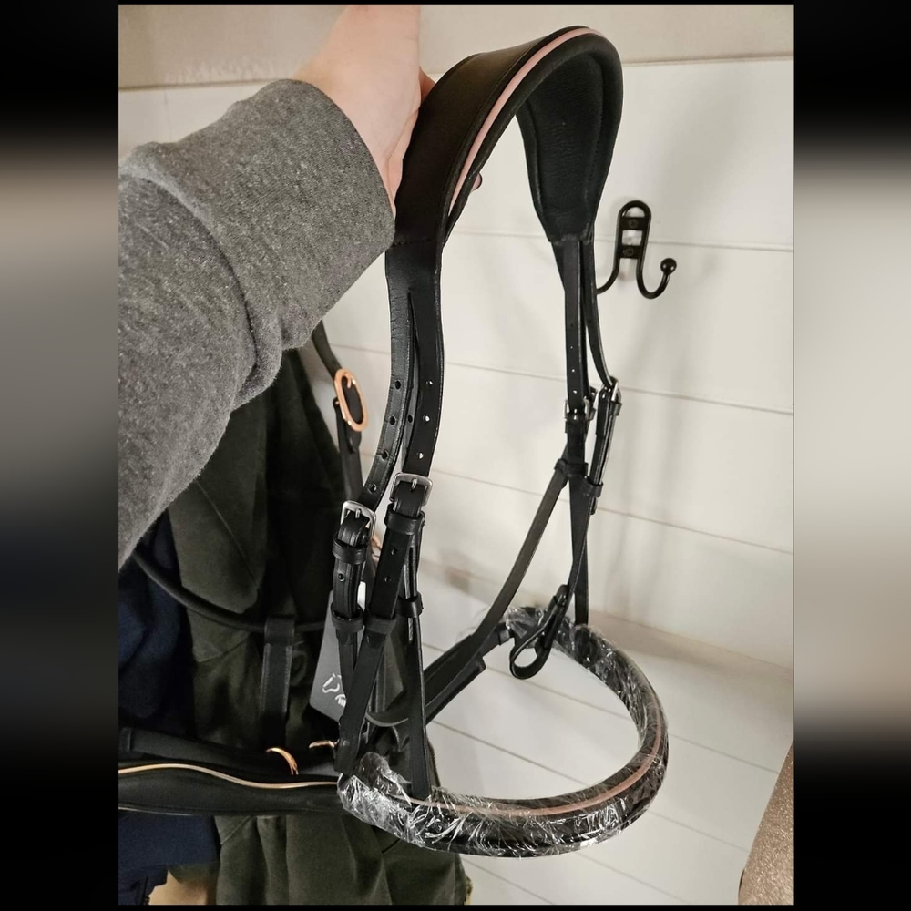 Black and pink snaffle bridle